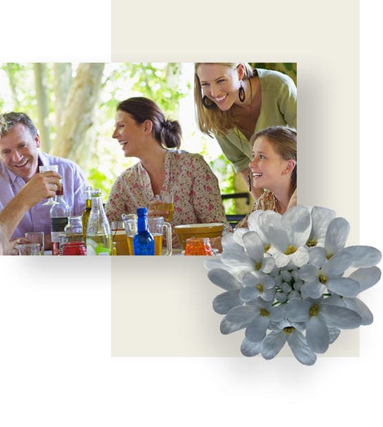 Joyful family enjoying meal in the garden.